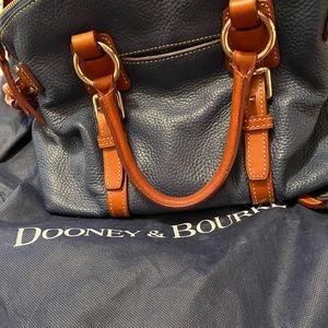 Purse, medium size with handles and shoulder strap.